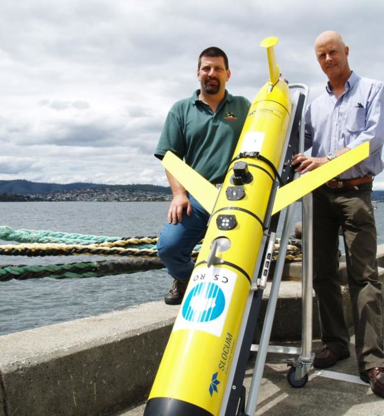 CSIRO ocean engineers Rob Gregor, left, and Lindsay MacDonald with the glider.